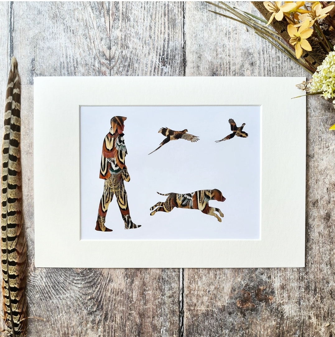 Man, running Labrador and Pheasants
